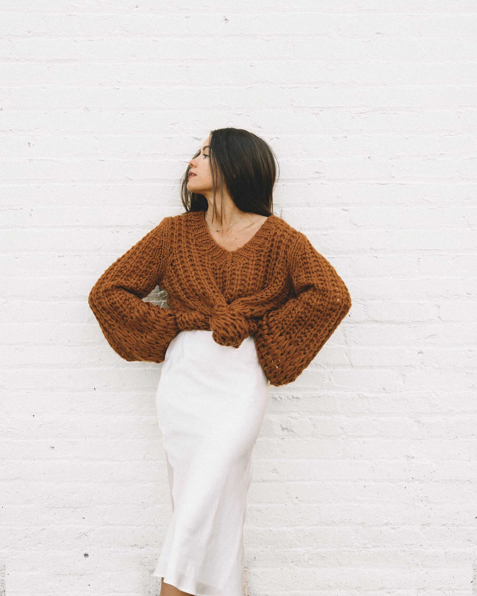 Brown Oversized Sweater Tied Over White Silk Slip Skirt — Sweater and Skirt Outfits 2027