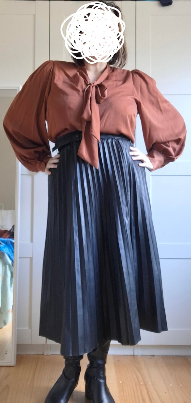 Satin Bow Blouse with Faux Leather Pleated Skirt Satin Bow Blouse with Faux Leather Pleated Skirt — Winter Office Outfits 2027