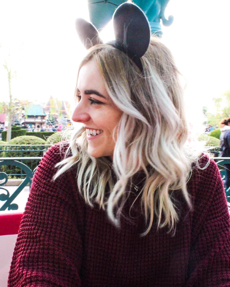 Burgundy Knit Sweater and Subtle Mickey Ears — Disney Winter Outfits 2027