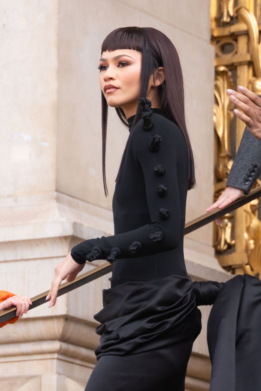Striking Black Hair With Triangle Bangs Striking Black Hair With Triangle Bangs — Black Bangs 2027