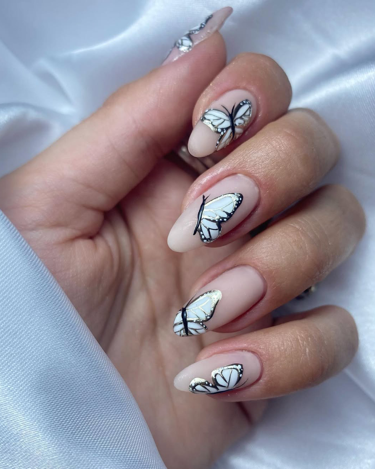 Sheer Nude White Gold Butterfly Almonds — Short Butterfly Almond Nails 2027