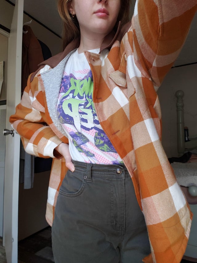 Vibrant Casual: Orange Plaid Flannel Jacket with Dark Pants Vibrant Casual: Orange Plaid Flannel Jacket with Dark Pants — Flannel Outfits 2027