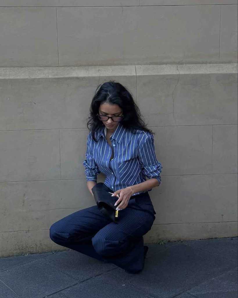 Classic Pinstripe Shirt and Trousers with a Modern Clutch — Corporate Baddie Outfits 2027