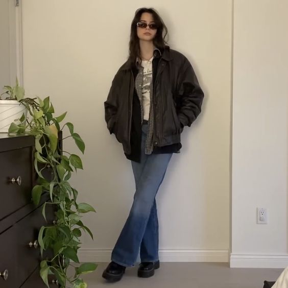 Edgy Oversized Leather Jacket with Flared Jeans Edgy Oversized Leather Jacket with Flared Jeans — Downtown Girl Outfits 2027