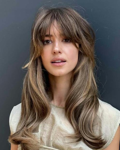 Shag With Wispy Bangs and Textured Waves Shag With Wispy Bangs and Textured Waves — Bangs Trends 2027