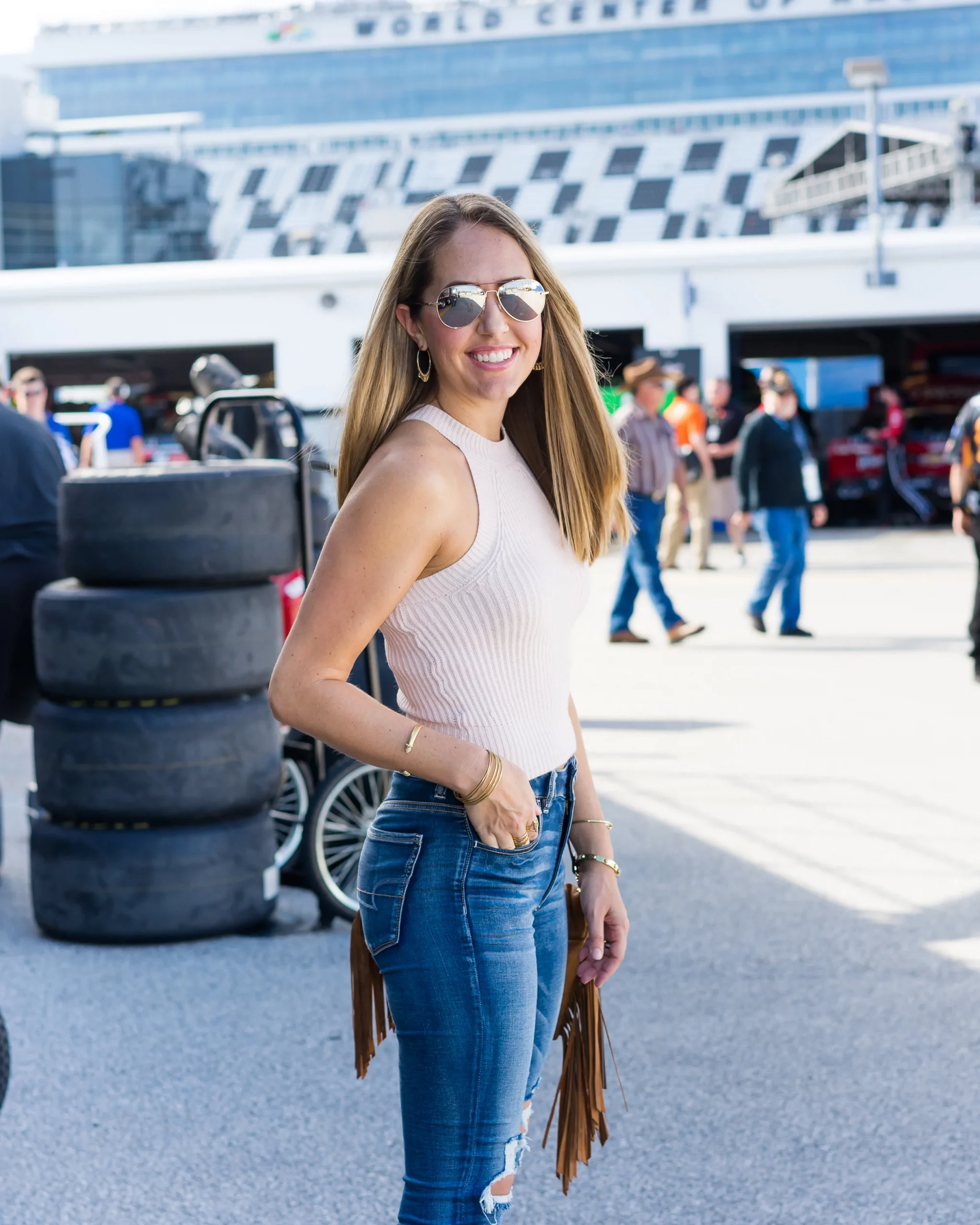 Sleeveless Knit Top with Distressed Blue Jeans — NASCAR Outfits 2027