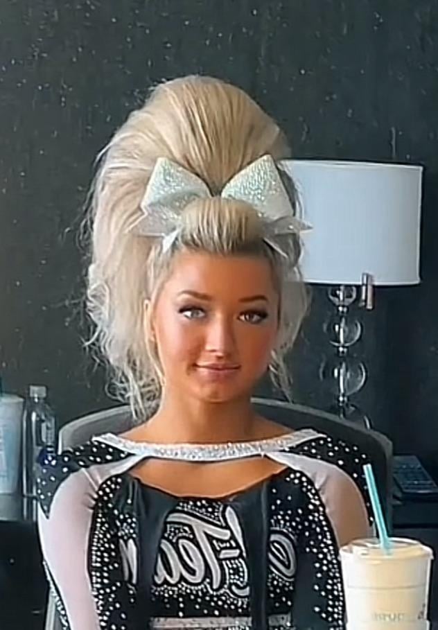 Voluminous Teased Blonde Ponytail Voluminous Teased Blonde Ponytail — Cheer Hairstyles 2027