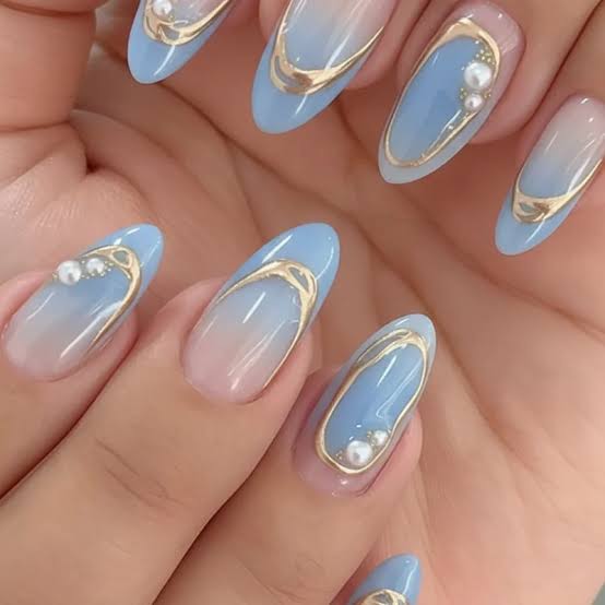 Light Blue Gradient with Gold Foil and Pearls Light Blue Gradient with Gold Foil and Pearls — Light Blue Quinceanera Nails 2027