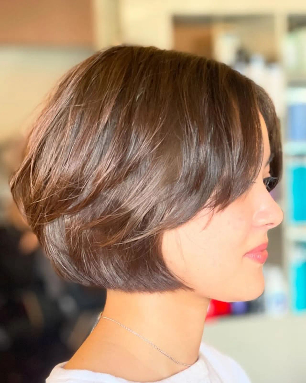 Layered Bob With Subtle Highlights Layered Bob With Subtle Highlights — Bob 2027 with Curtain Bangs