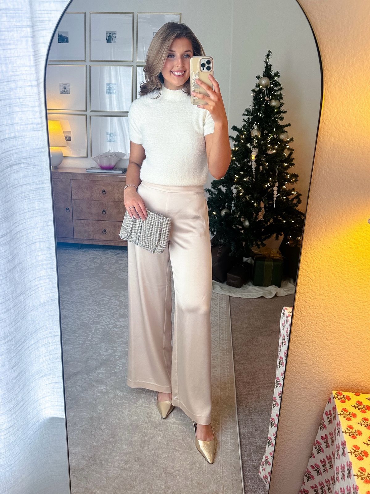 White Fuzzy Sweater And Champagne Satin Trousers White Fuzzy Sweater And Champagne Satin Trousers — Winter Dinner Outfits 2027