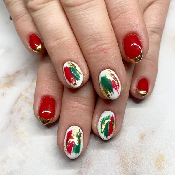 Red with Gold French Tips and Abstract Art — Short Christmas Nails 2026