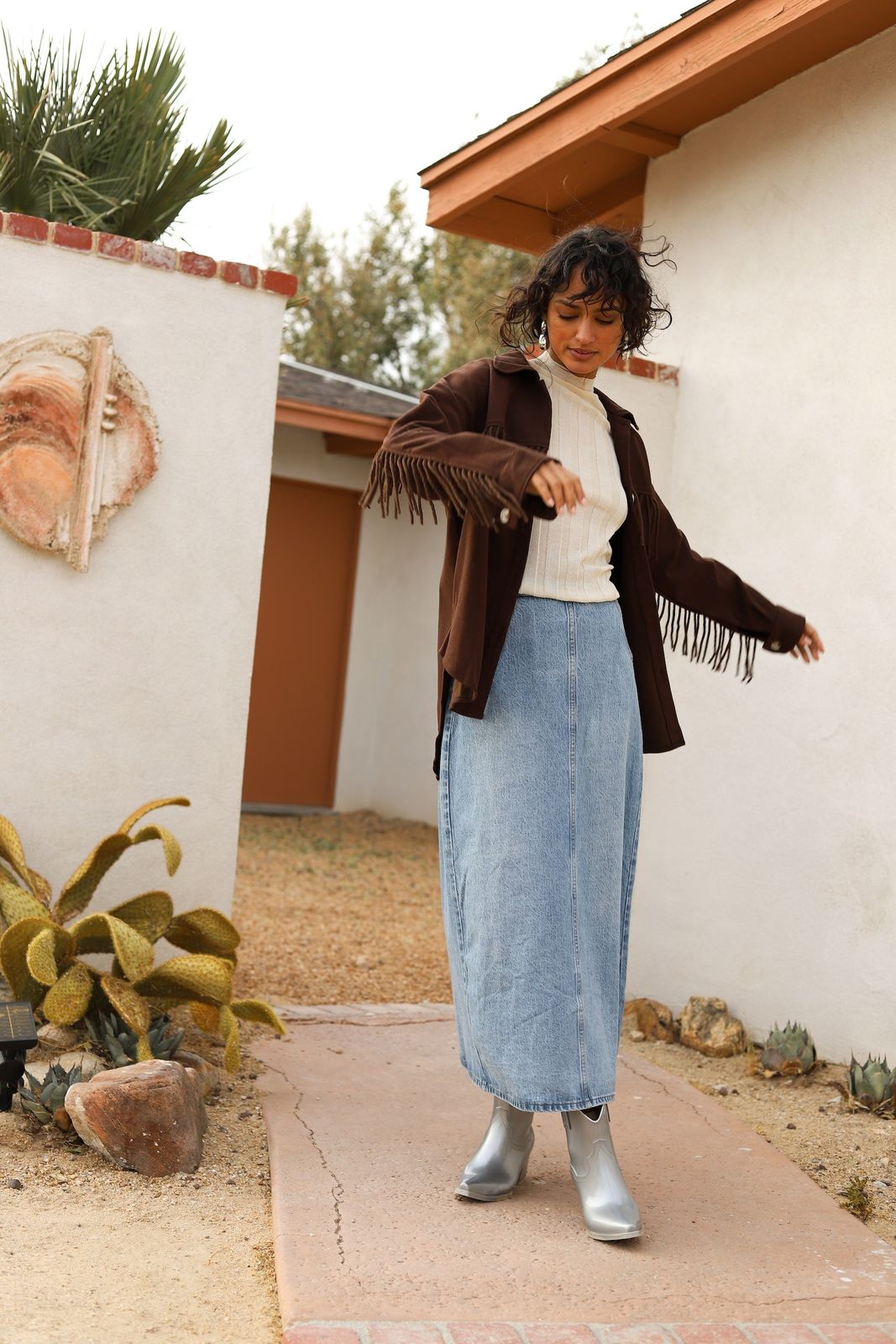 Boho Luxe: Brown Fringe Jacket with Maxi Skirt and Metallic Boots Boho Luxe: Brown Fringe Jacket with Maxi Skirt and Metallic Boots — Fringe Jacket Outfits 2027