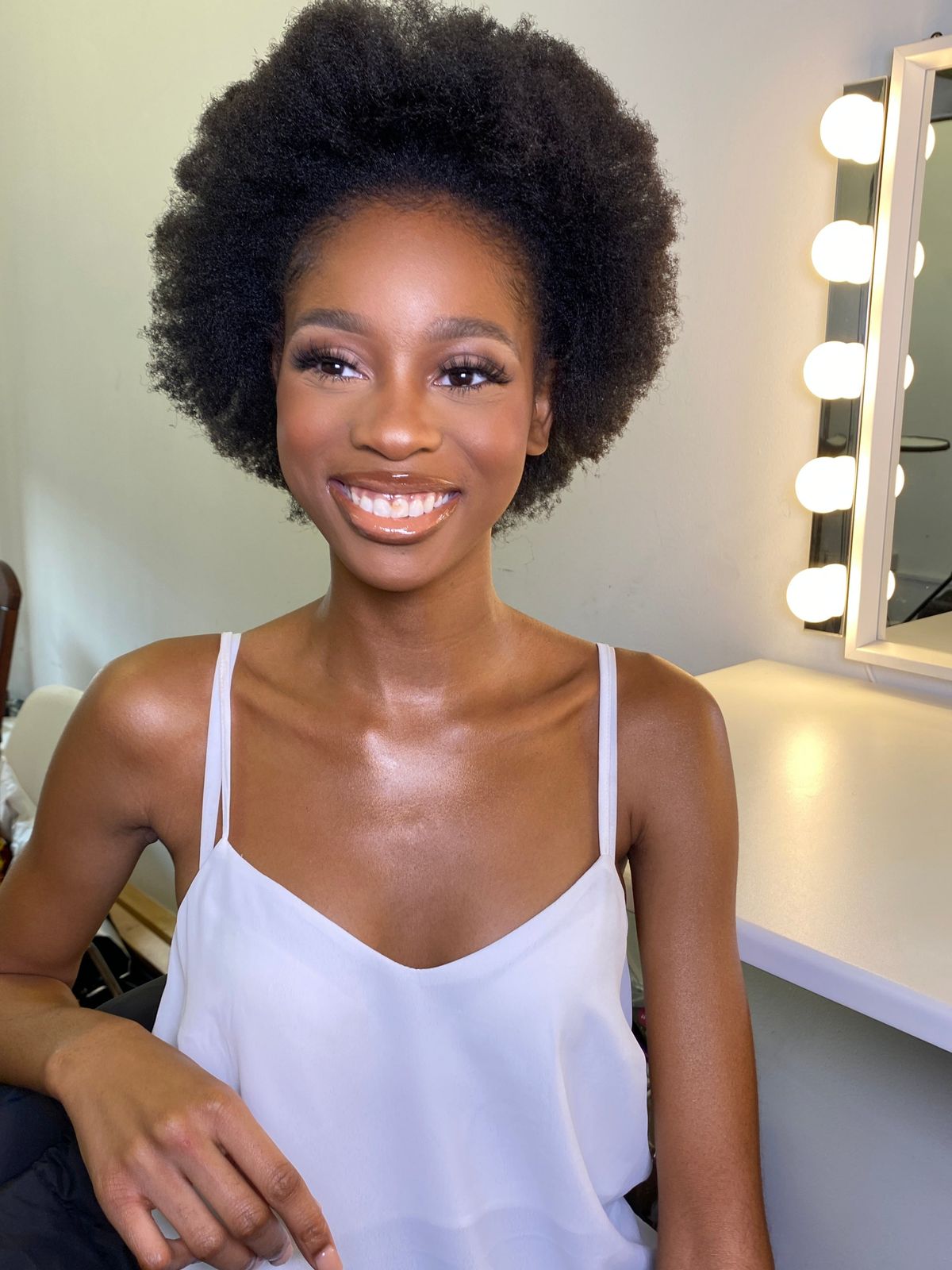 Shoulder-Length Voluminous Black Afro Shoulder-Length Voluminous Black Afro — Wash and Go Hairstyles 2027