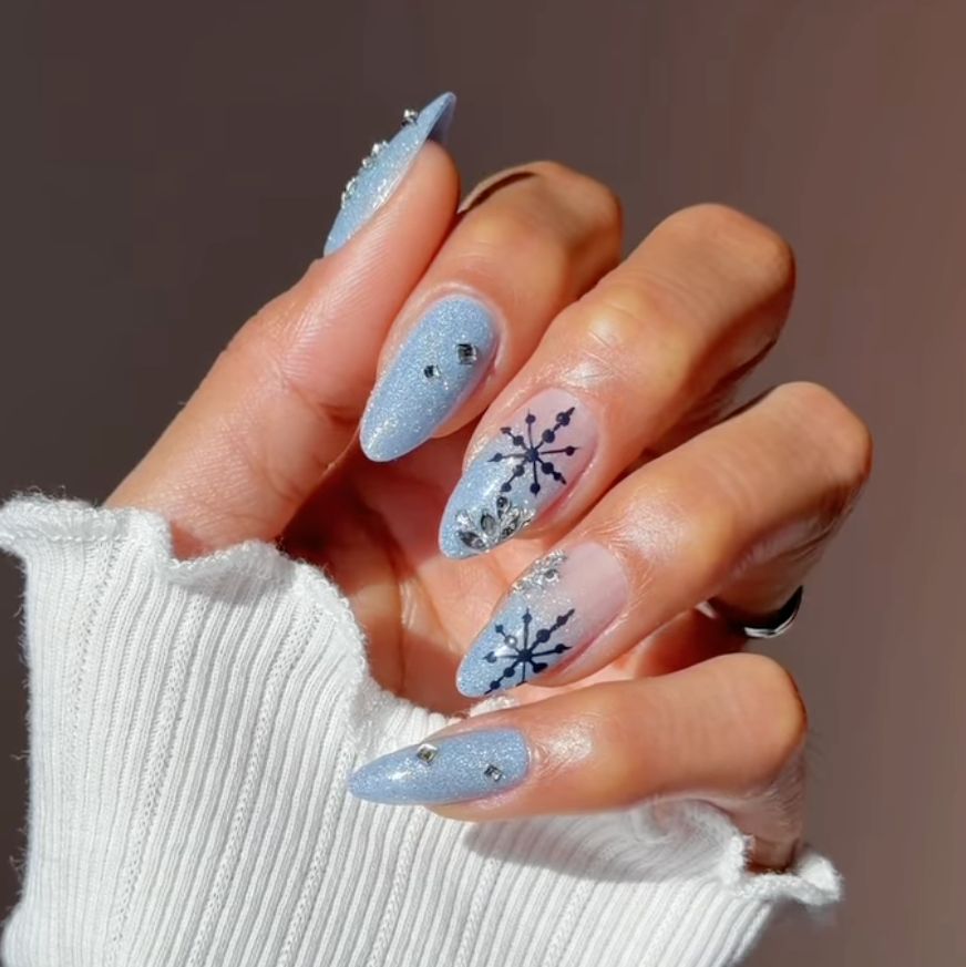 Light Blue Glitter Stilettos with Snowflakes Light Blue Glitter Stilettos with Snowflakes — Christmas Acrylic Nails 2026