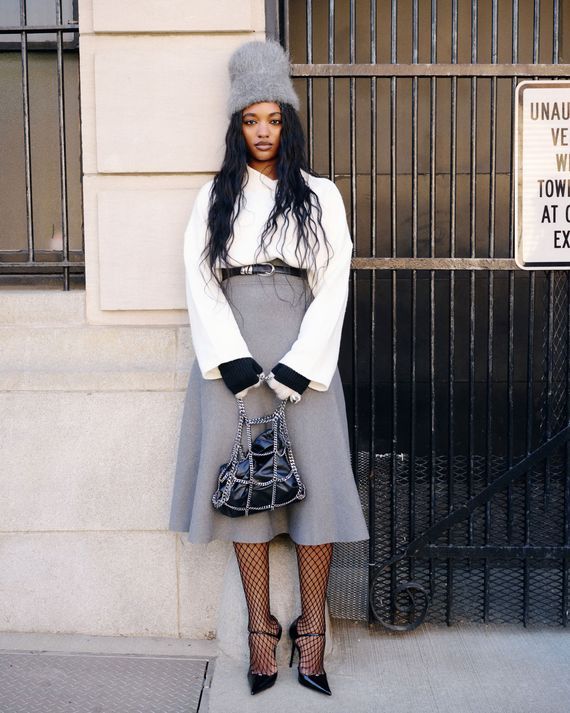 Textured A-Line Skirt with Faux Fur Hat for a Bold Office Statement Textured A-Line Skirt with Faux Fur Hat for a Bold Office Statement — Tech Office Outfits 2027