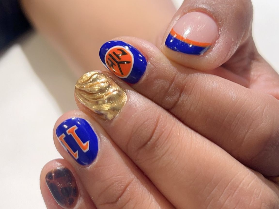 Visual Idea — Orange Cheer Nails Team Colors 2027