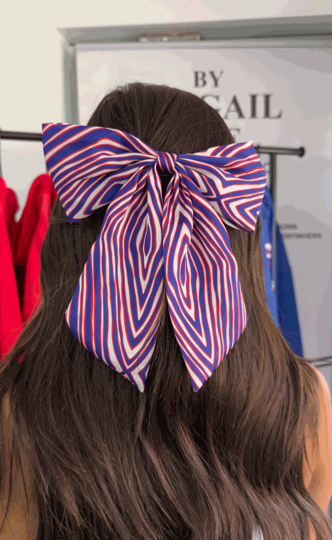 Mid-Back Straight Hair with Patriotic Bow Mid-Back Straight Hair with Patriotic Bow — Game Day Hairstyles 2026