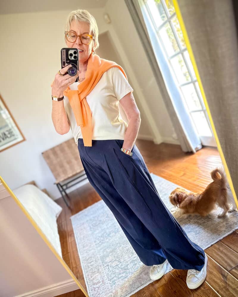 Navy Wide-Leg Pants with Tied Orange Sweater Navy Wide-Leg Pants with Tied Orange Sweater — Sporty Chic Outfits 2027