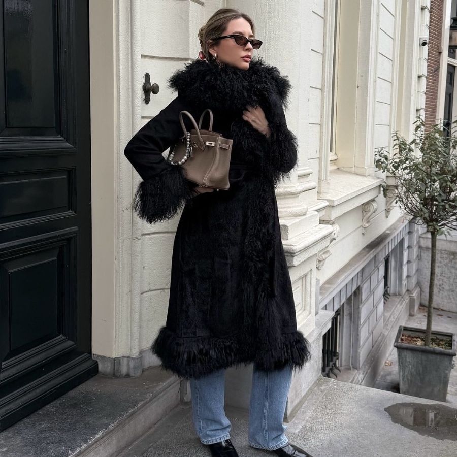 Elegant Detail: Black Coat with Fur Trim and Light Blue Jeans — Cold Weather Outfits 2027