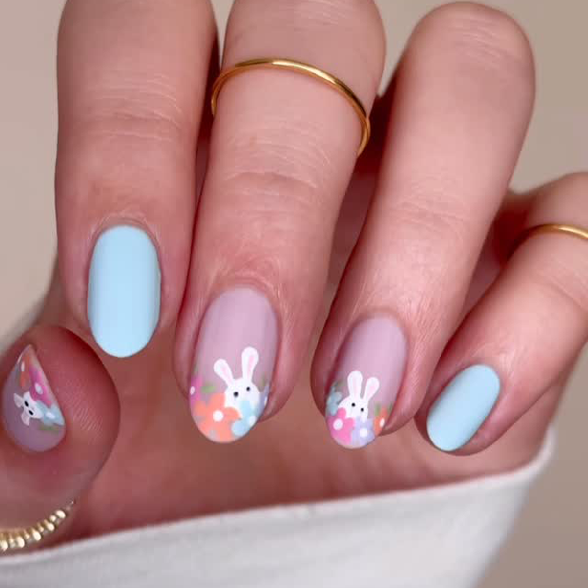 Matte Blue Bunny Motifs on Sheer Pink Matte Blue Bunny Motifs on Sheer Pink — Funny Bunny Nails 2027