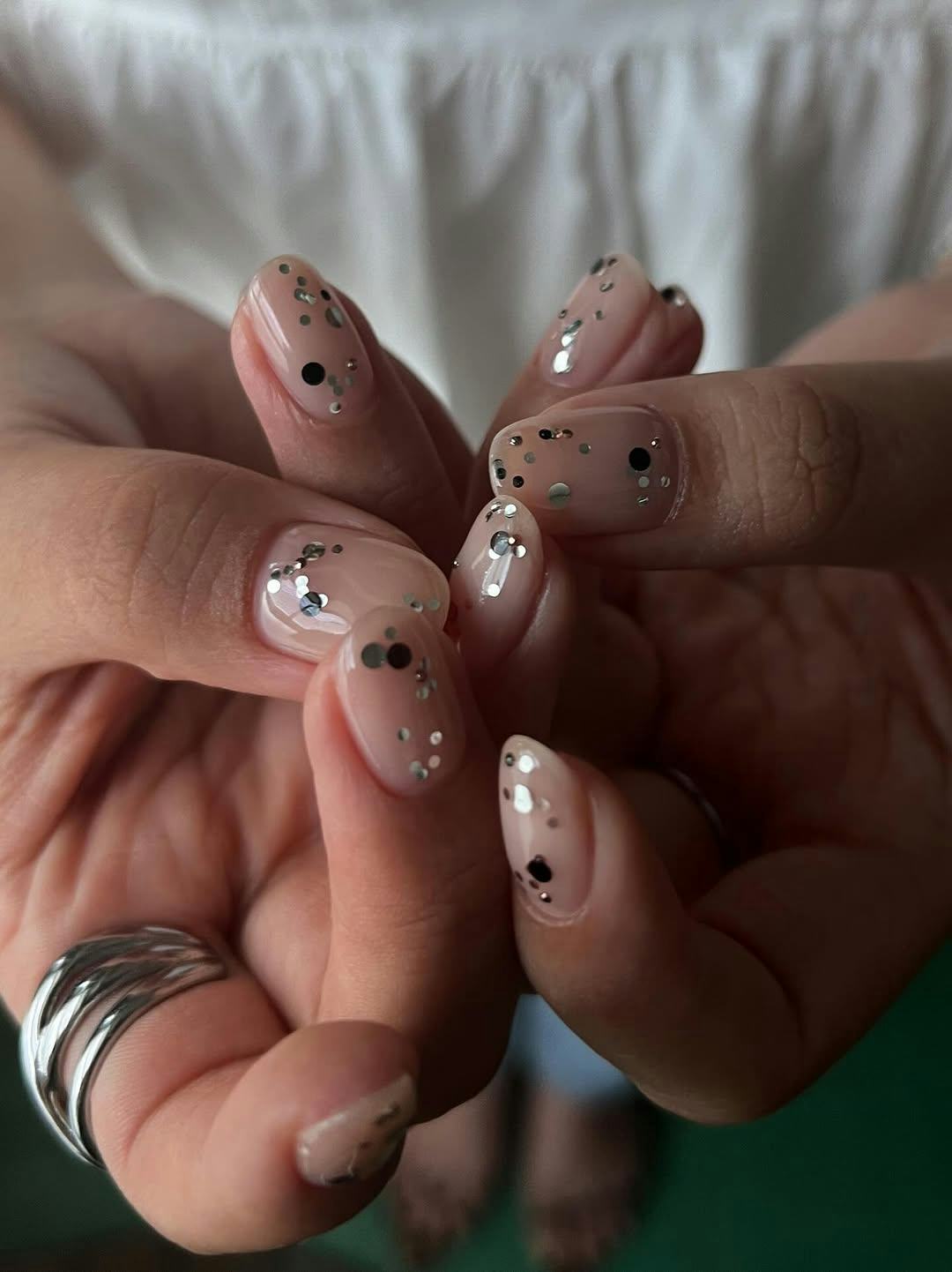 Nude Glitter Scatter Oval Nails Nude Glitter Scatter Oval Nails — Medium Length Winter Nails 2027