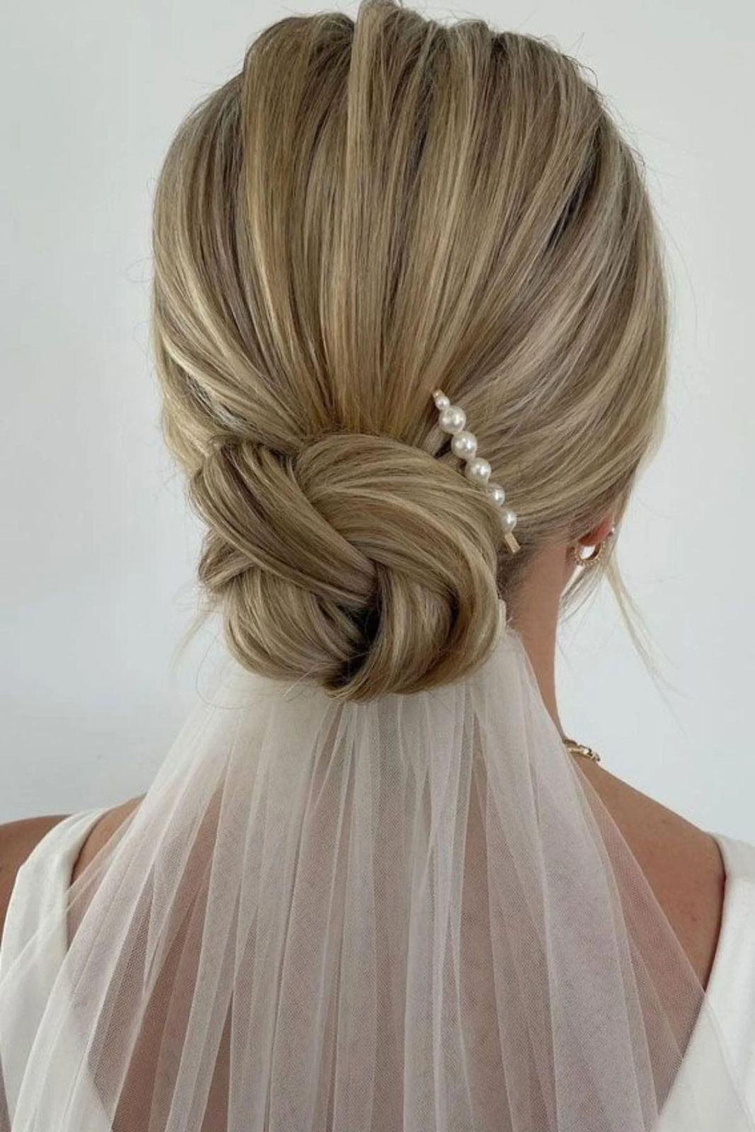 Low Braided Bun With Veil Low Braided Bun With Veil — Church Wedding Hairstyles 2027