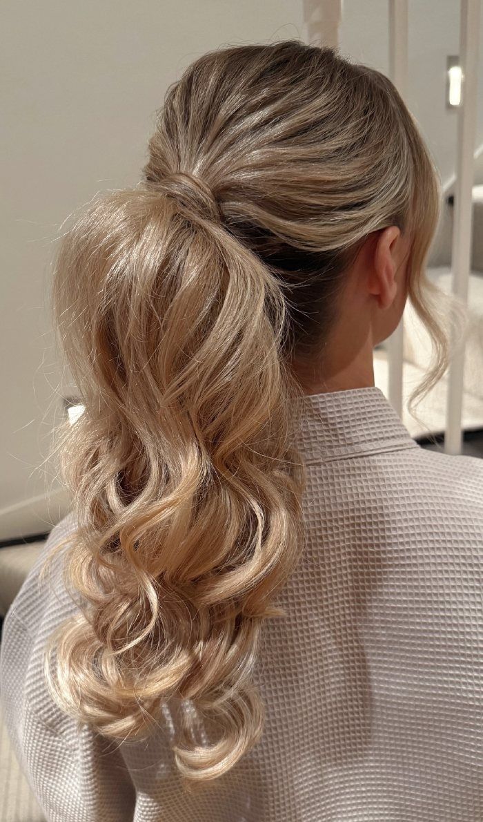 High Ponytail With Flowing Ash Blonde Curls High Ponytail With Flowing Ash Blonde Curls — Engagement Party Hairstyles 2027