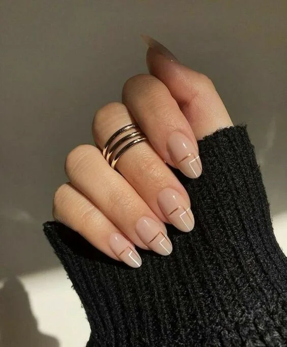 Medium Almond Geometric Gold Lines Medium Almond Geometric Gold Lines — Winter Nude Nails 2027