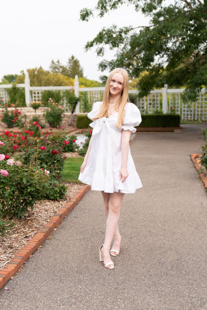 Feminine Charm: Babydoll Dress with Bow Detail Feminine Charm: Babydoll Dress with Bow Detail — Senior Photo Outfits 2027
