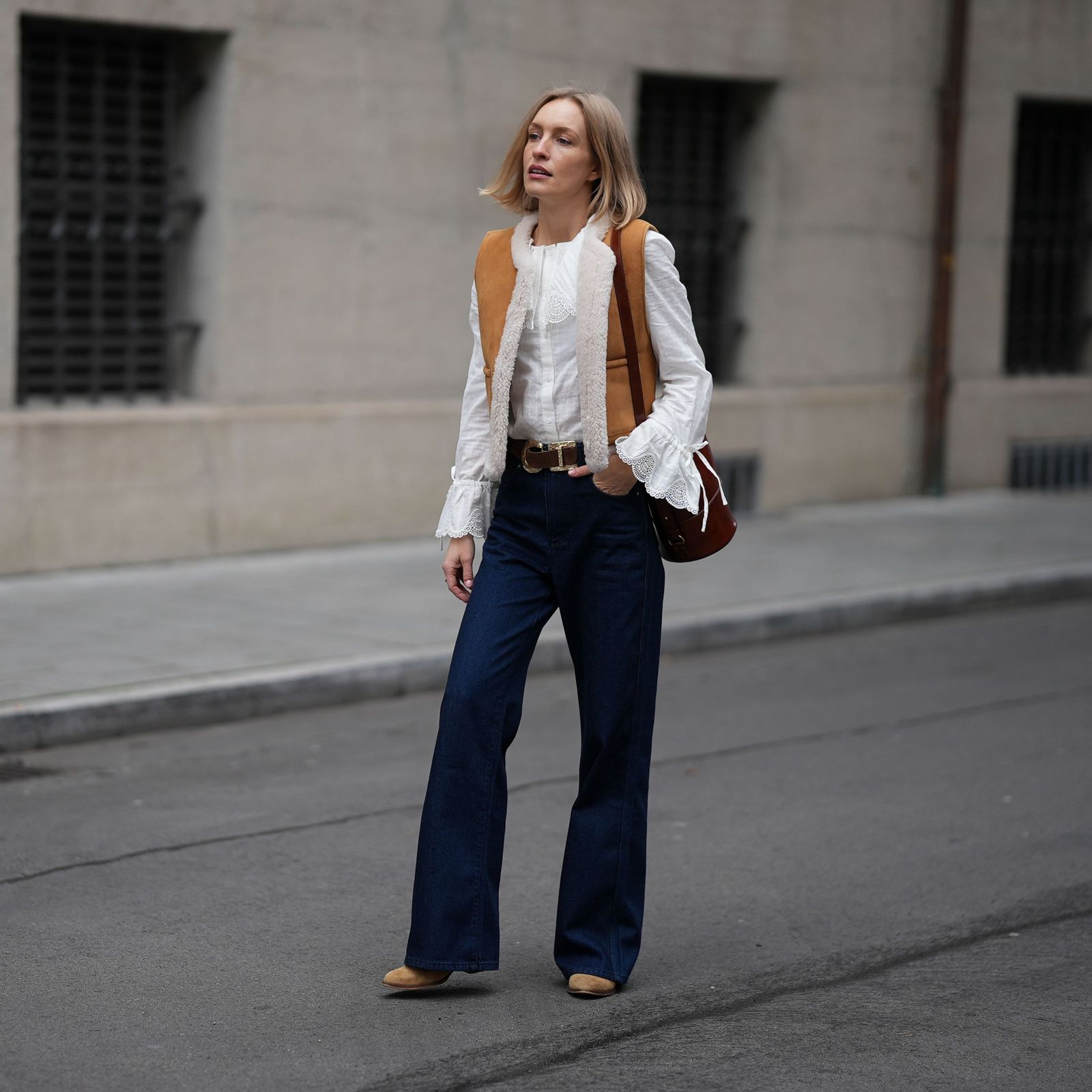 Dark Wash Bootcut Jeans with Suede Vest and Lace Blouse — Black Bootcut Jeans Outfits 2027