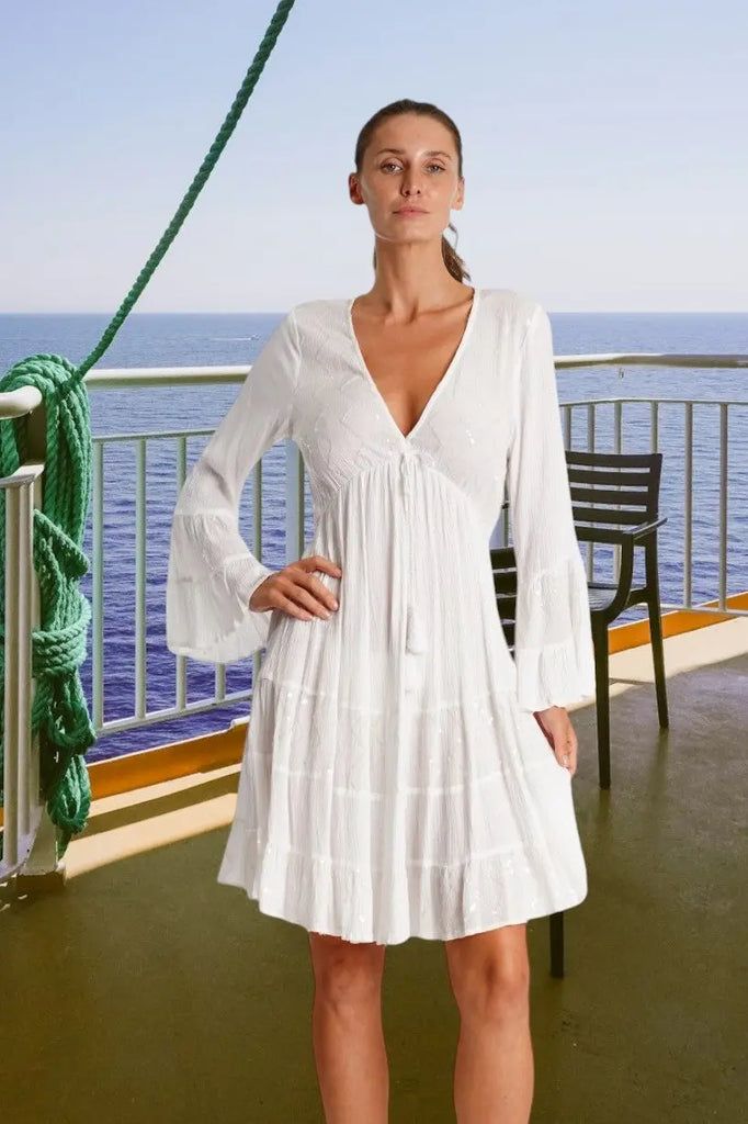 White Tiered Mini Dress with Bell Sleeves for Casual Cruise Days or Evenings White Tiered Mini Dress with Bell Sleeves for Casual Cruise Days or Evenings — Cruise Dinner Dress 2027