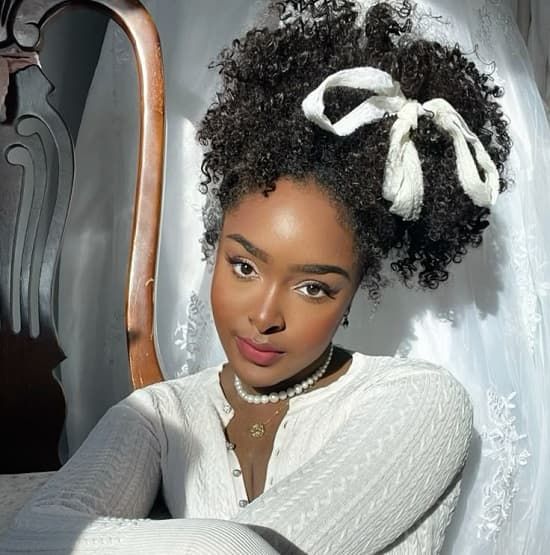 Curly Mid-Back Hair With White Lace Bow Curly Mid-Back Hair With White Lace Bow — Coquette Hairstyles 2027