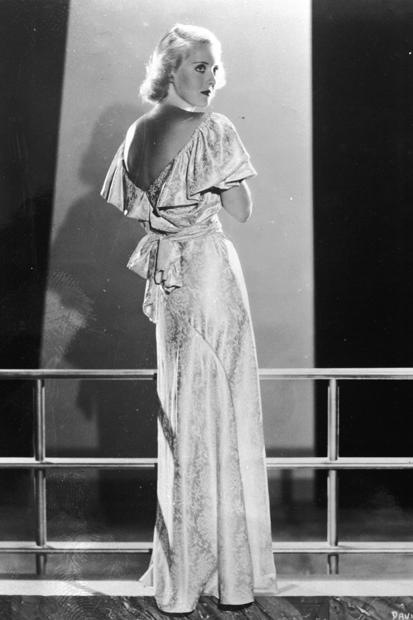 Brocade Dress with Draped Back and Bow Detail Brocade Dress with Draped Back and Bow Detail — Old Hollywood Outfits 2027