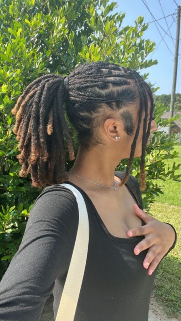 Mid-Back High Ponytail With Braided Accents Mid-Back High Ponytail With Braided Accents — Summer Locs Styles 2027
