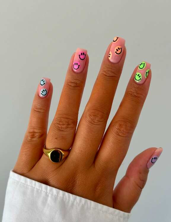 One Hand Visual Idea One Hand Visual Idea — Pink Smiley Face Nails 2027
