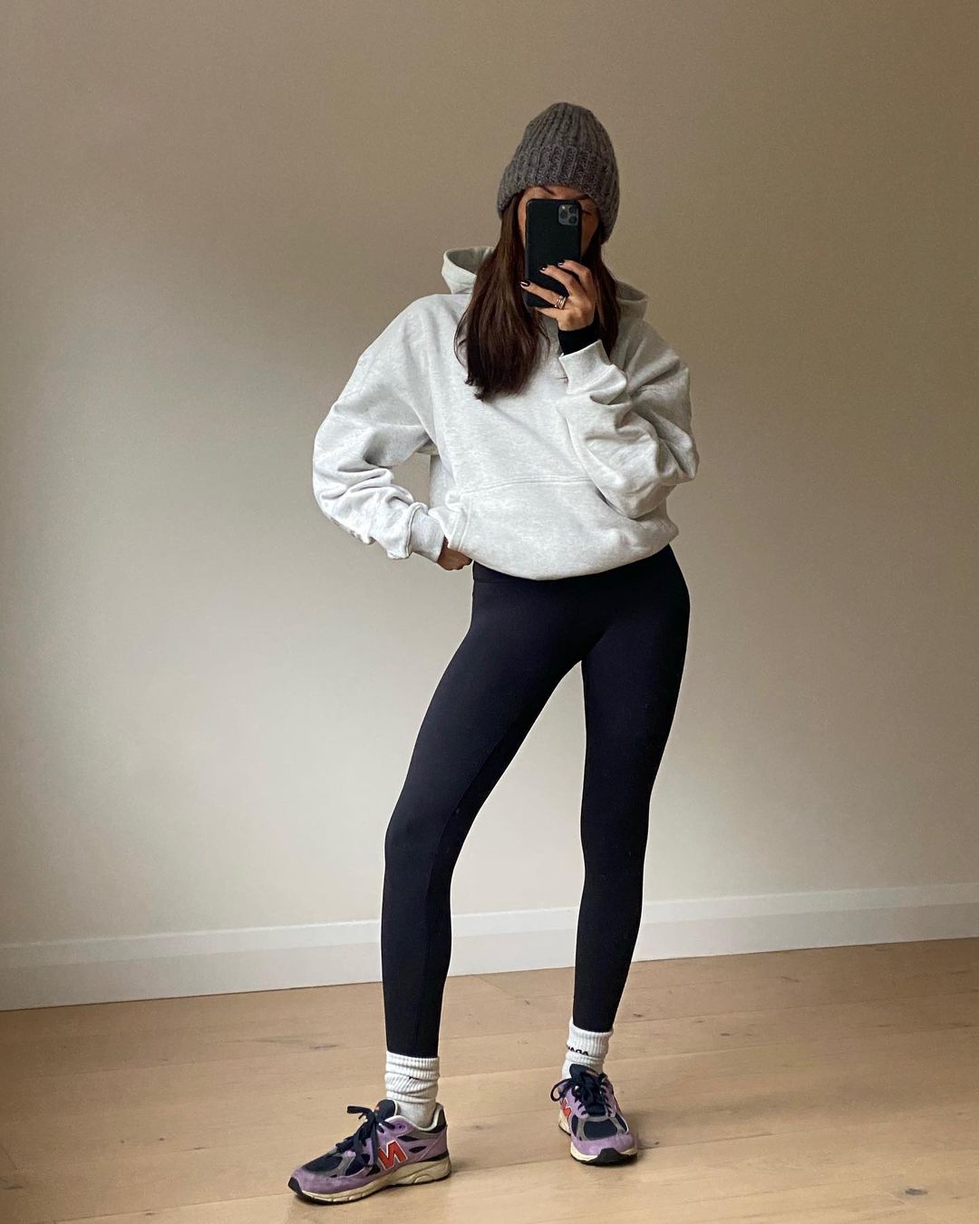 Oversized Grey Hoodie Over Black Activewear — Gym Outfits 2027