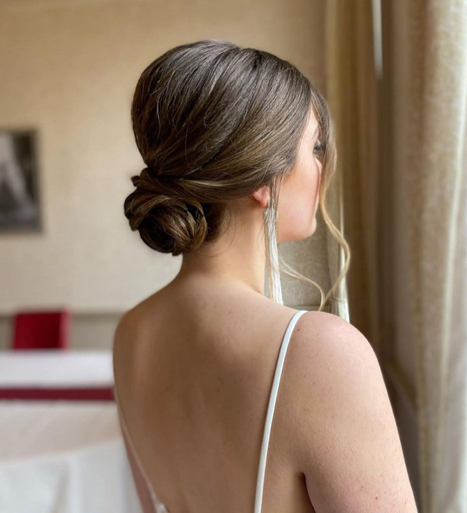 Collarbone High Bun with Wispy Curtain Bangs Collarbone High Bun with Wispy Curtain Bangs — Bun Hairstyles 2027