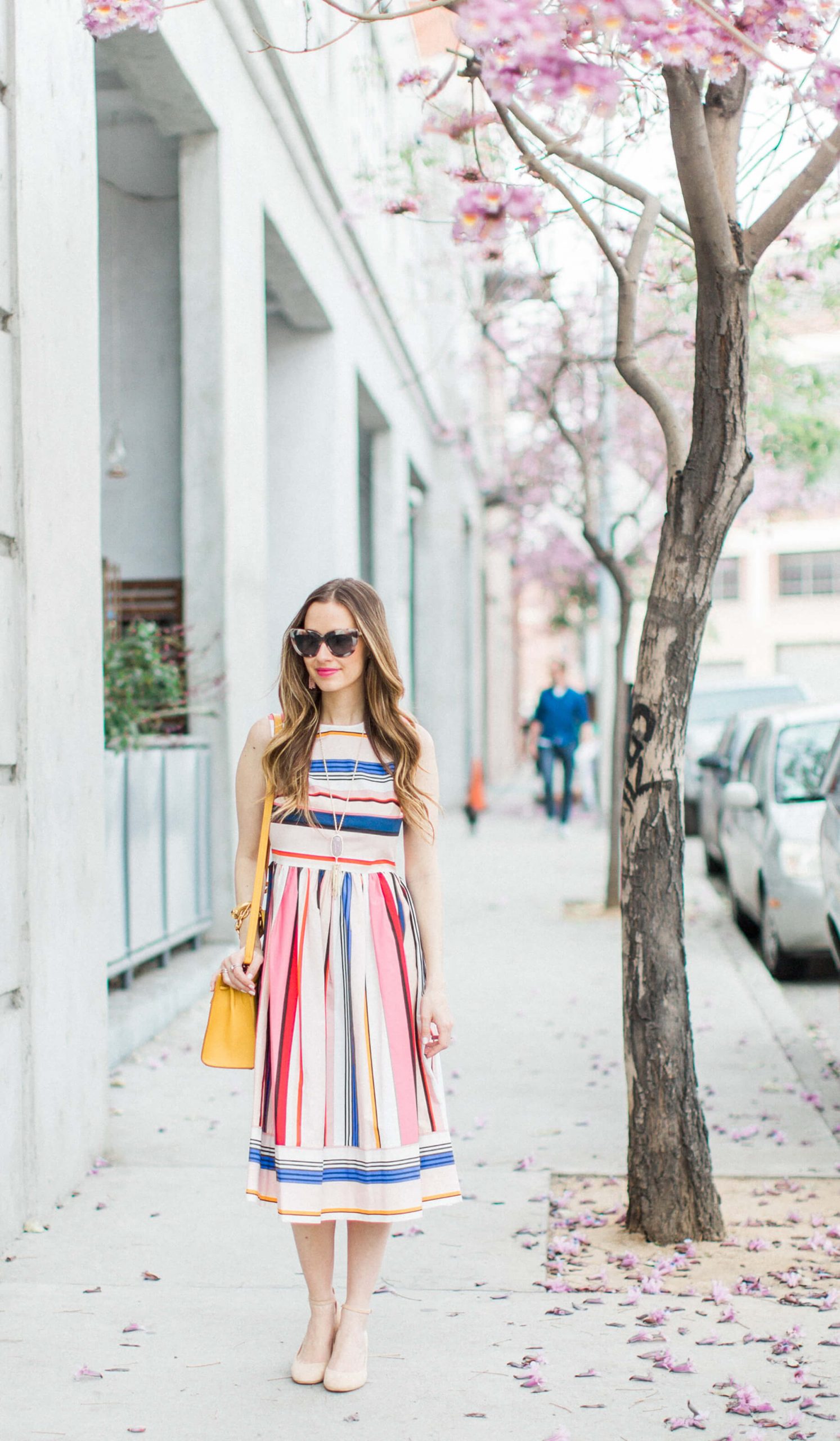 Vibrant Multicolored Fit-and-Flare Midi Dress for Daytime Events Vibrant Multicolored Fit-and-Flare Midi Dress for Daytime Events — Striped Dresses 2027