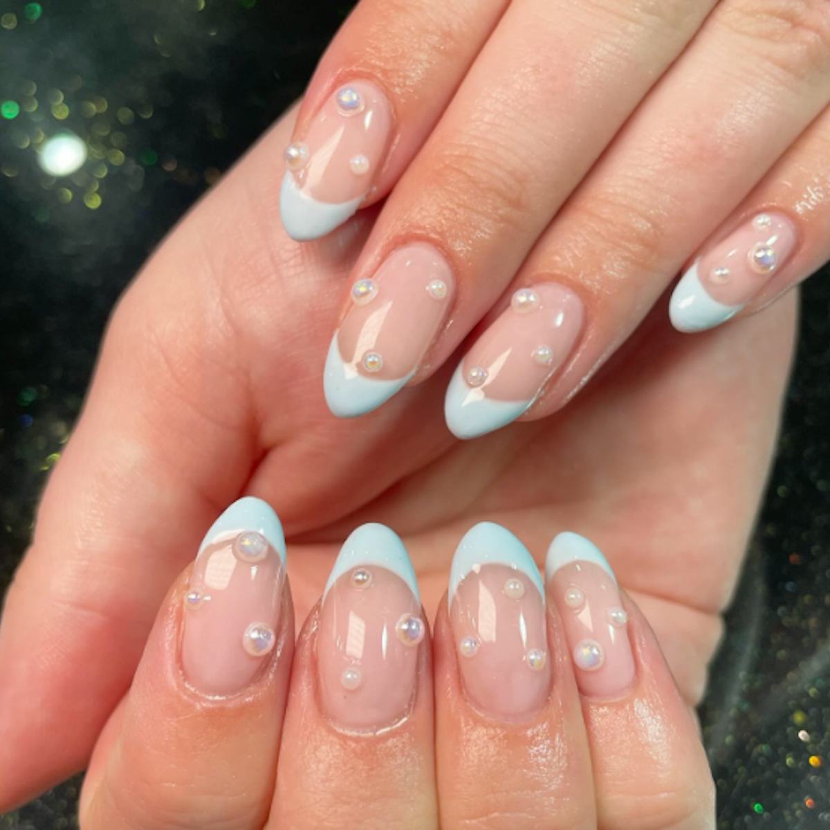 Sheer Nude with Light Blue French Tips and Pearls Sheer Nude with Light Blue French Tips and Pearls — Light Blue Quinceanera Nails 2027