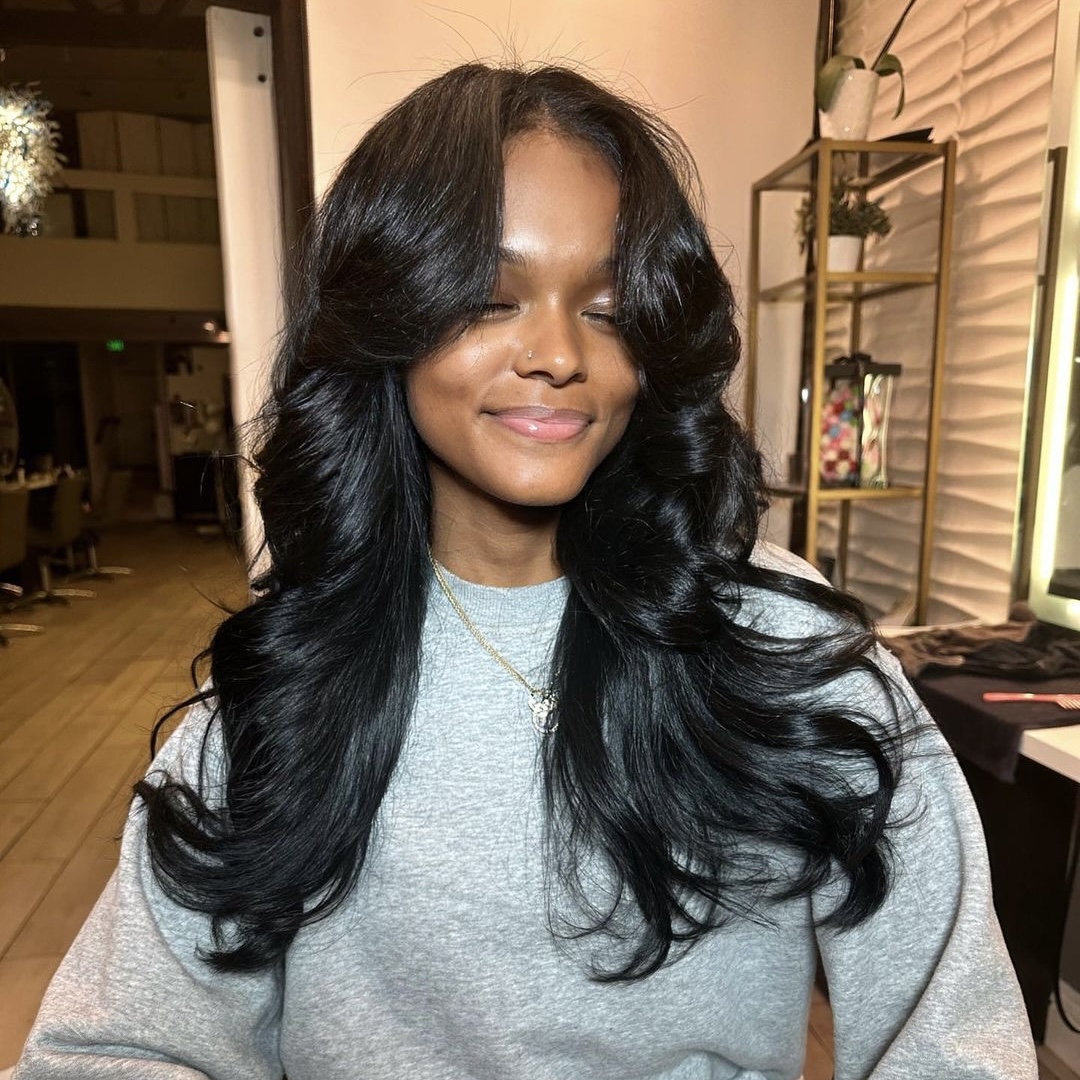 Blowout with Curls and Curtain Bangs Blowout with Curls and Curtain Bangs — Hairstyles 2027 for Black Women