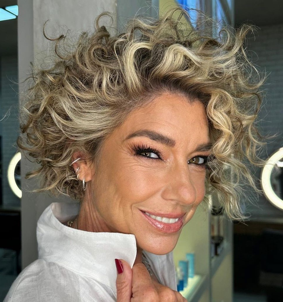 Voluminous Curly Blonde with Dark Roots — Hair Color 2027 for Women Over 60