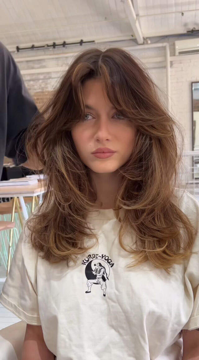 Mid-Back Shag With Full Bangs Mid-Back Shag With Full Bangs — Trendy Haircuts 2027