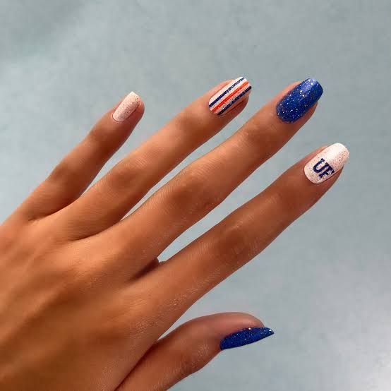 UF Logo Glitter Blue Orange Stripes UF Logo Glitter Blue Orange Stripes — Cheer Nails Team Colors 2027