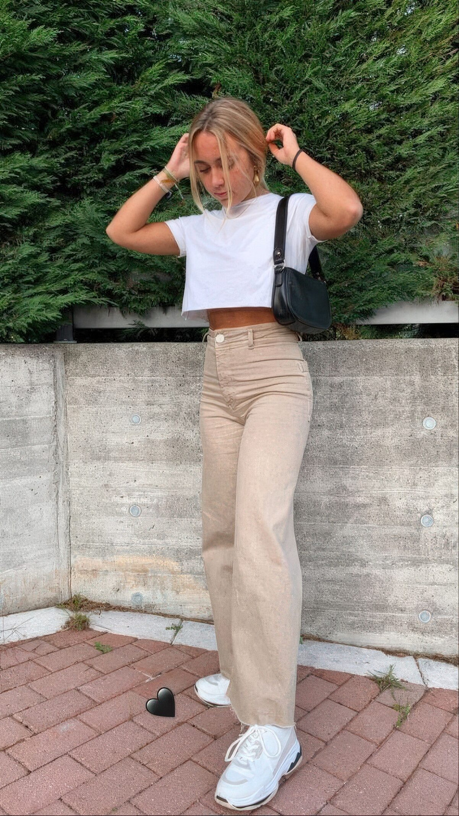 White Cropped Tee, Beige Trousers, and Black Shoulder Bag White Cropped Tee, Beige Trousers, and Black Shoulder Bag — Baguette Bag Aesthetic 2027
