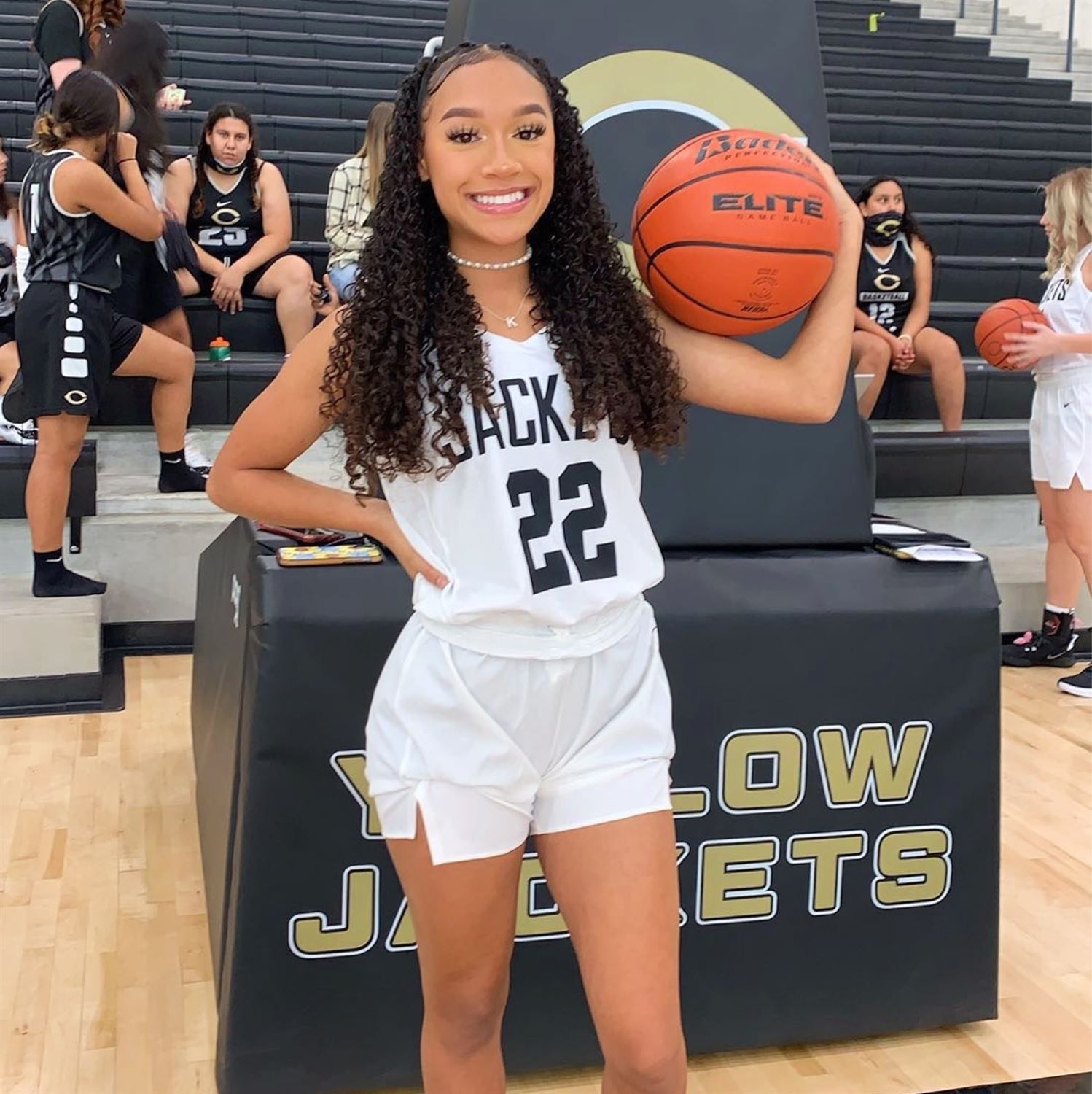 Voluminous Curls With Side-Swept Bangs — Basketball Hairstyles Girls 2027