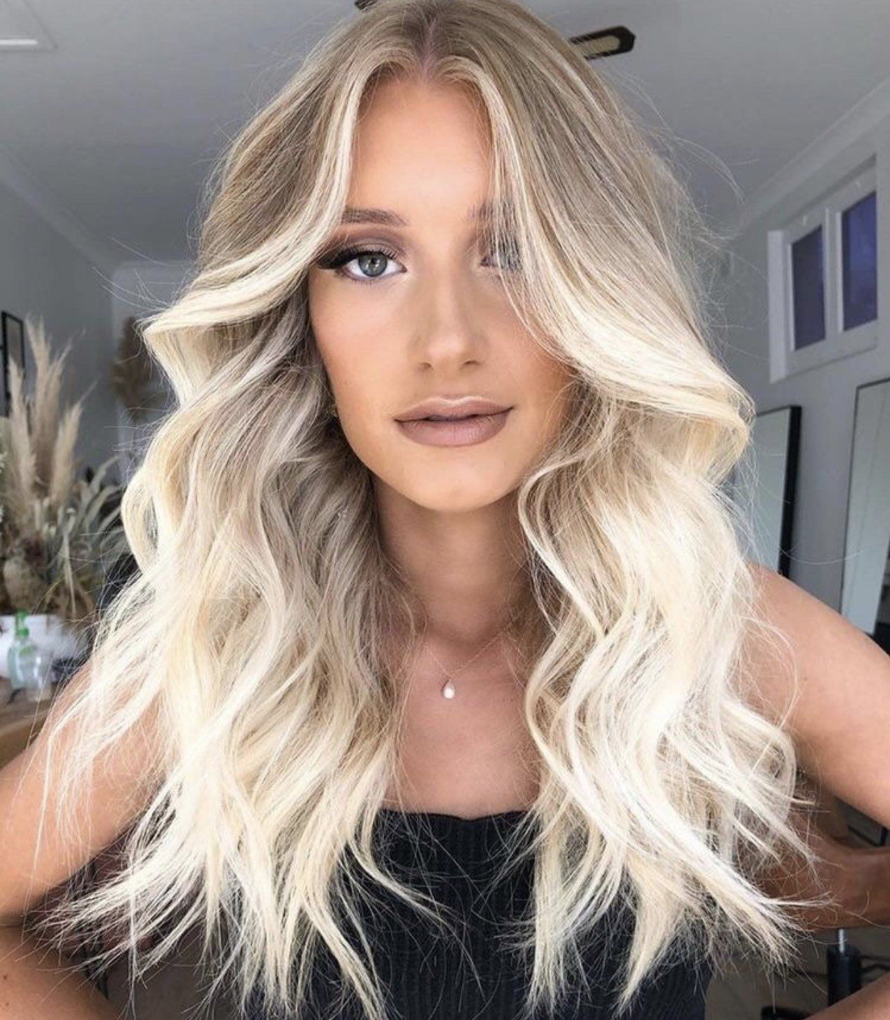 Platinum Blonde with Dark Root Shadow and Curls Platinum Blonde with Dark Root Shadow and Curls — Blonde Hair 2027 with Dark Roots
