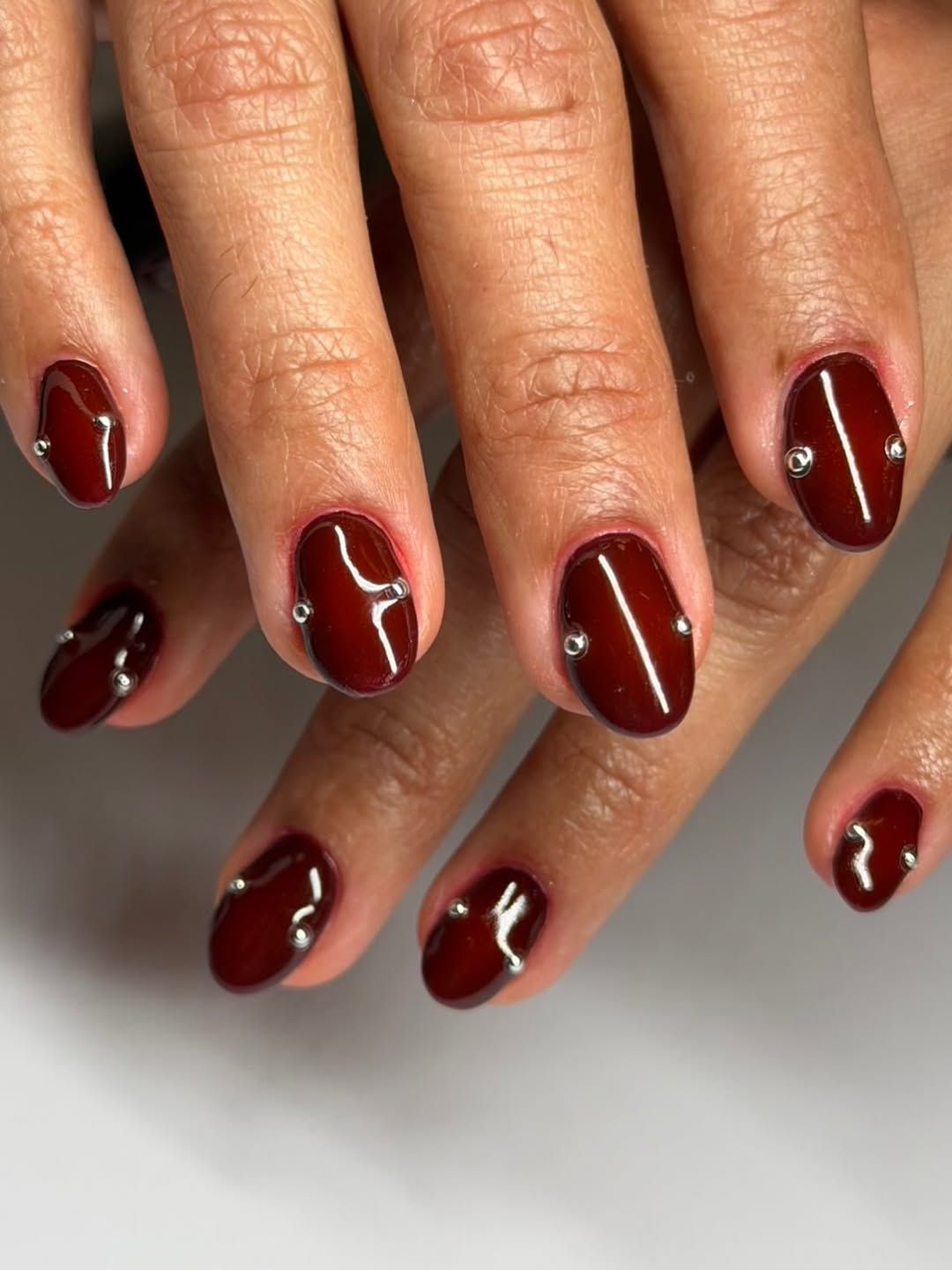 Burgundy With Minimalist Silver Studs — Burgundy Nails 2027