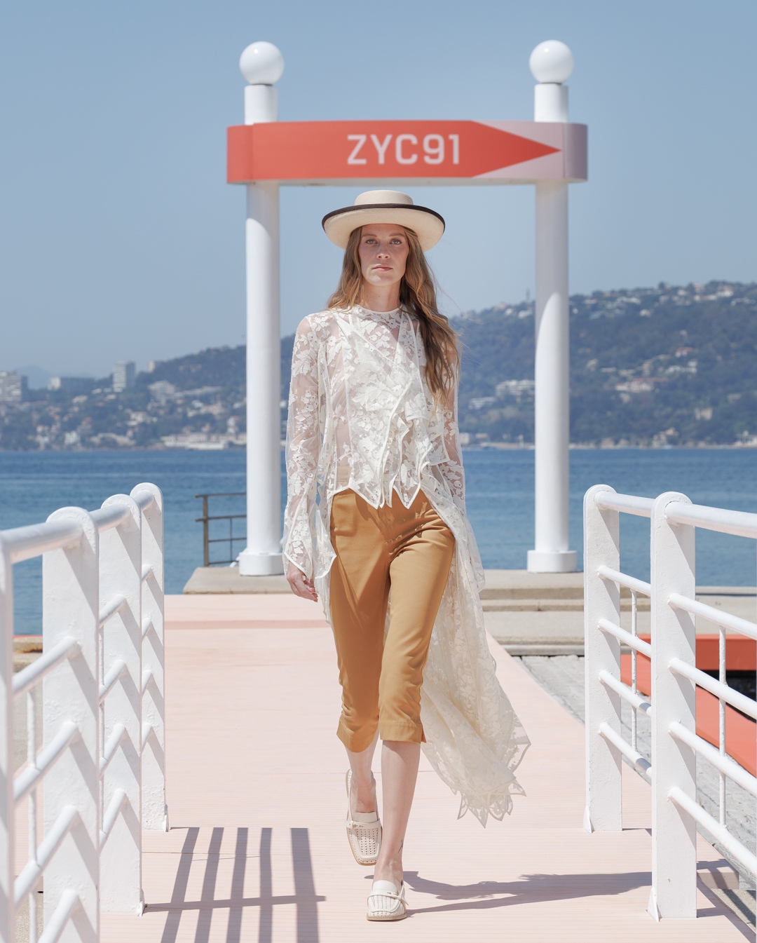 White Lace Tunic Over Cropped Trousers for a Chic Cruise Ensemble — Cruise Outfits 2027