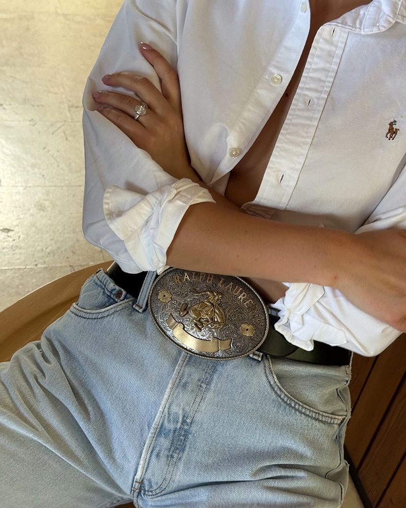 Denim and Shirt Highlighted by an Engraved Logo Belt Denim and Shirt Highlighted by an Engraved Logo Belt — Statement Belt Outfits 2027