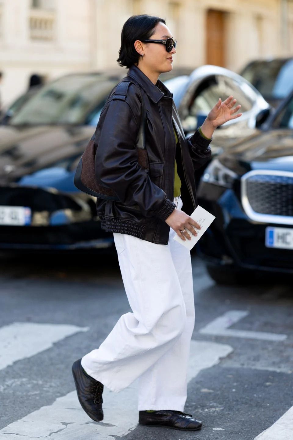 Black Leather Bomber Jacket with Lime Green Turtleneck — Winter Minimalist Outfits 2027